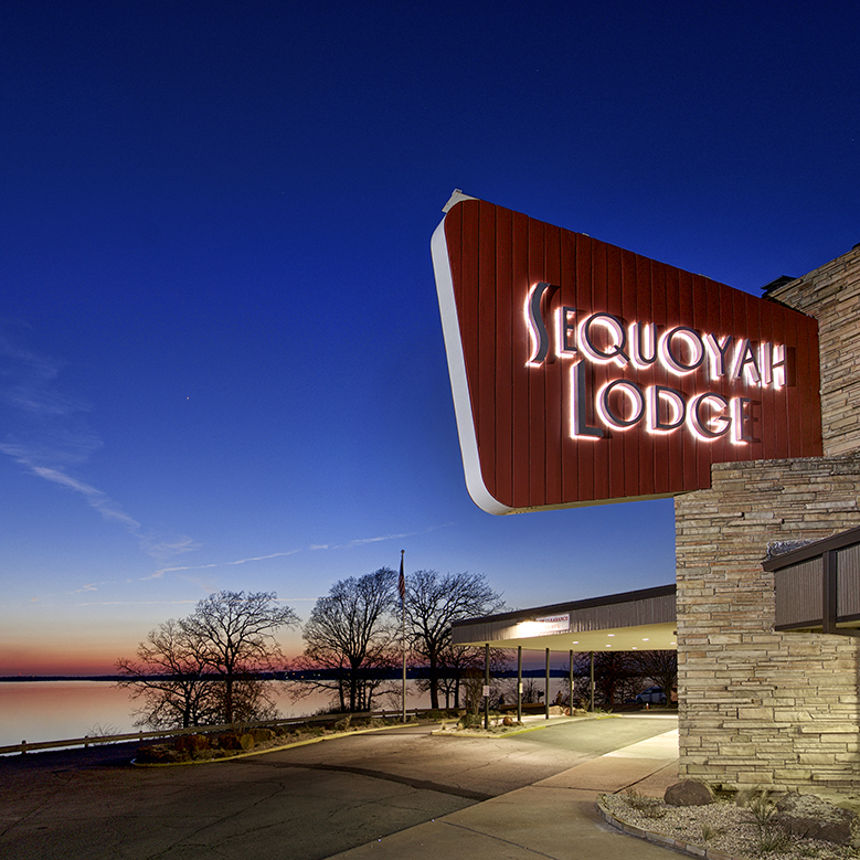 Classic Lodge signage overlooking lake